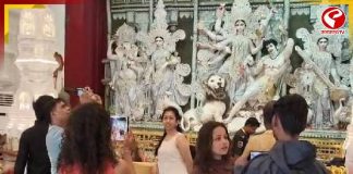 হাঁটু পর্যন্ত জল, তবুও শ্রীভূমিতে ভিড় দর্শনার্থীদের