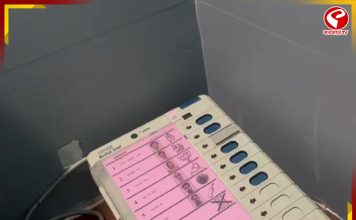 ভোট চলাকালীন বিপত্তি! বিজেপির প্রতীকে টেপ সেঁটে দেওয়ার অভিযোগ